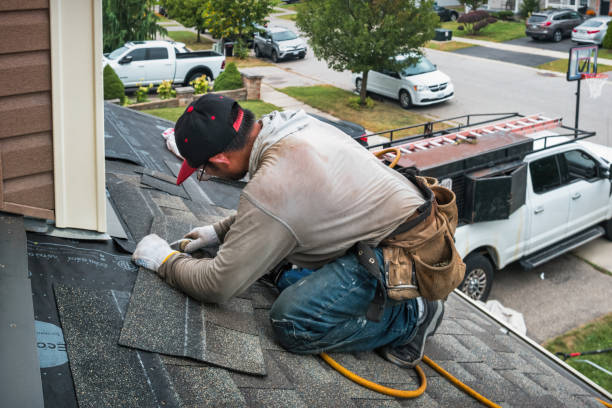 Professional Emergency Roof Repair technician working in North Bend, PA